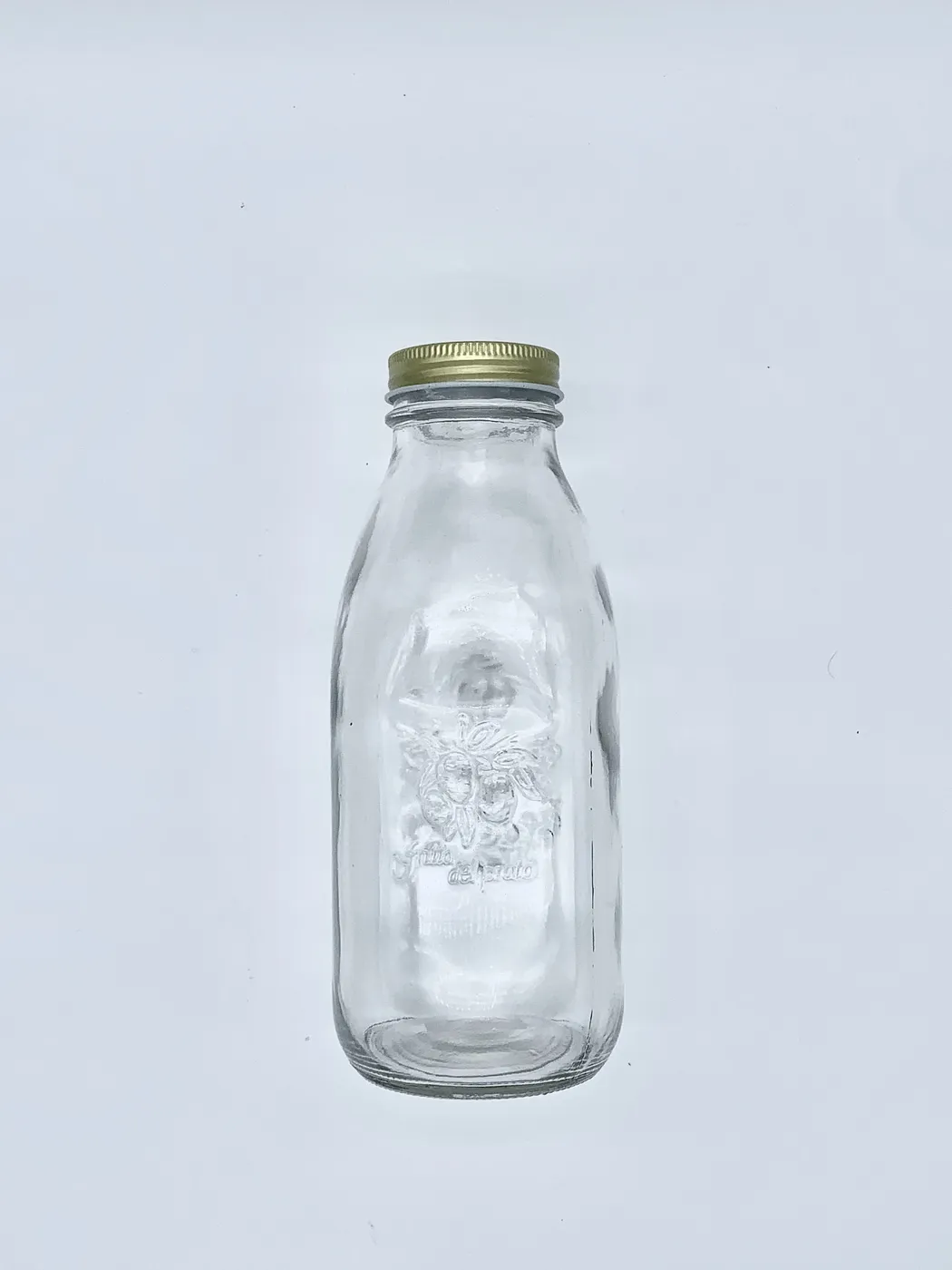 BOTELLA CON TAPA DORADA