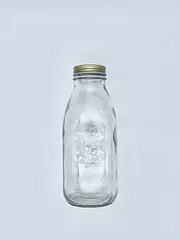 BOTELLA CON TAPA DORADA